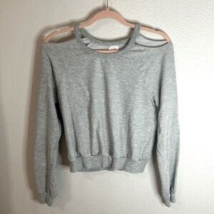 Size medium, trendy cut out shoulder sweatshirt